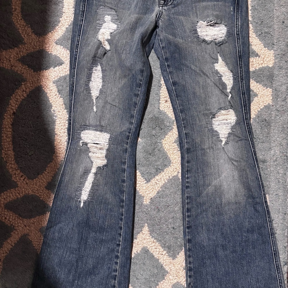 7 For All Mankind Distressed Flare Jeans in Dark Blue